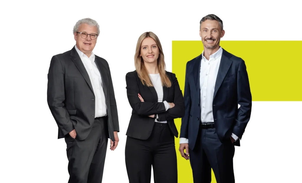 Das Foto zeigt drei Mitarbeitende der SaarLB